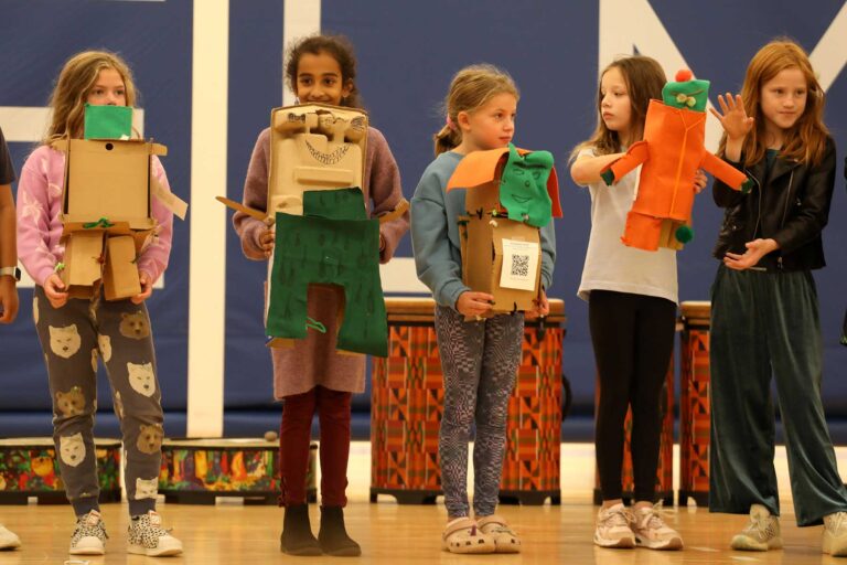 Fourth graders display their projects at Sharing Assembly