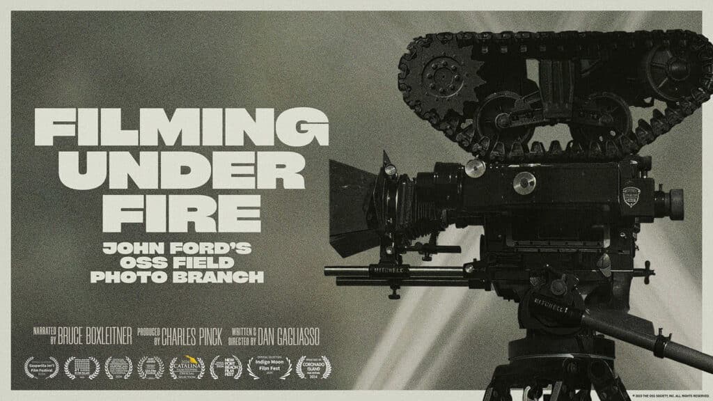 Advertising still for the film "Filming Under Fire"