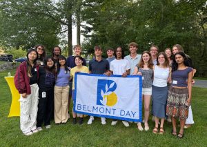 Members so the Class of 2021 hold the school banner at their 5-year reunion 2026